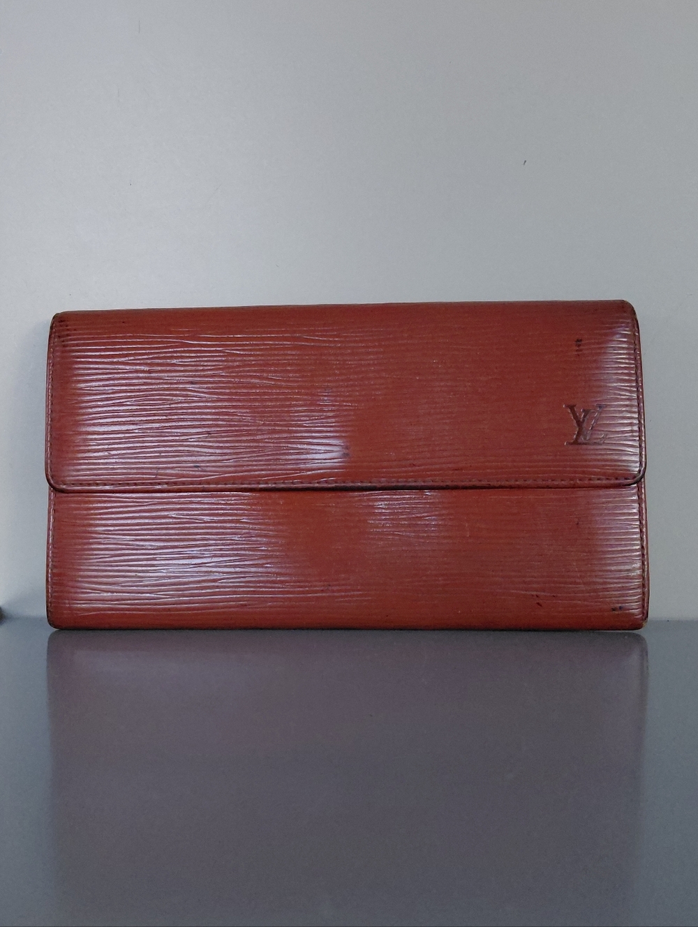 Louis Vuitton Epi Leather Clutch in Deep Red-Brown